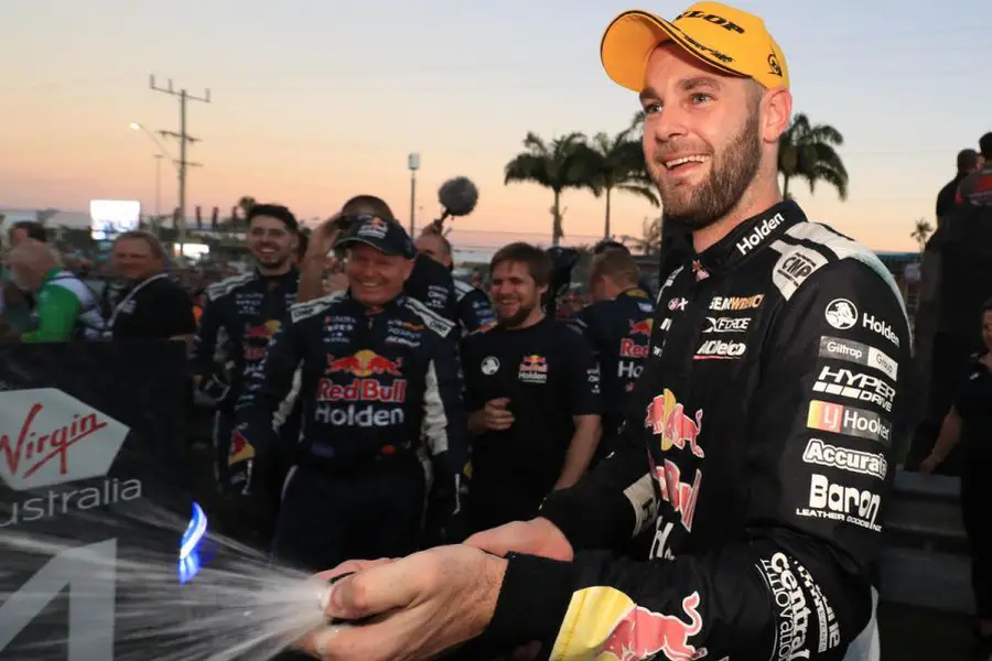 Shane van Gisbergen celebrates his third win of the season