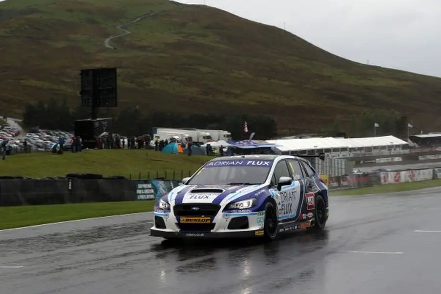 Ashley Sutton has won the first race at rainy Knockhill