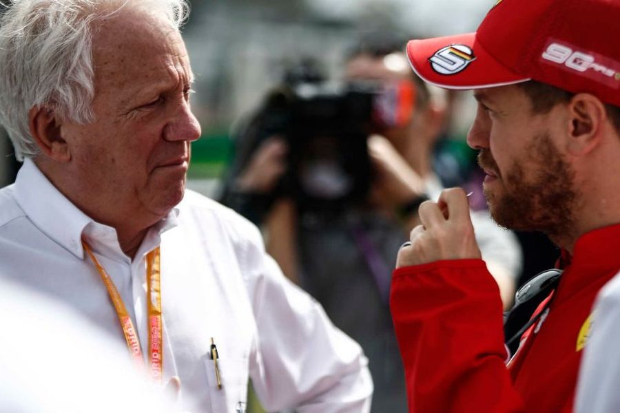 Charlie Whiting and Sebastian Vettel