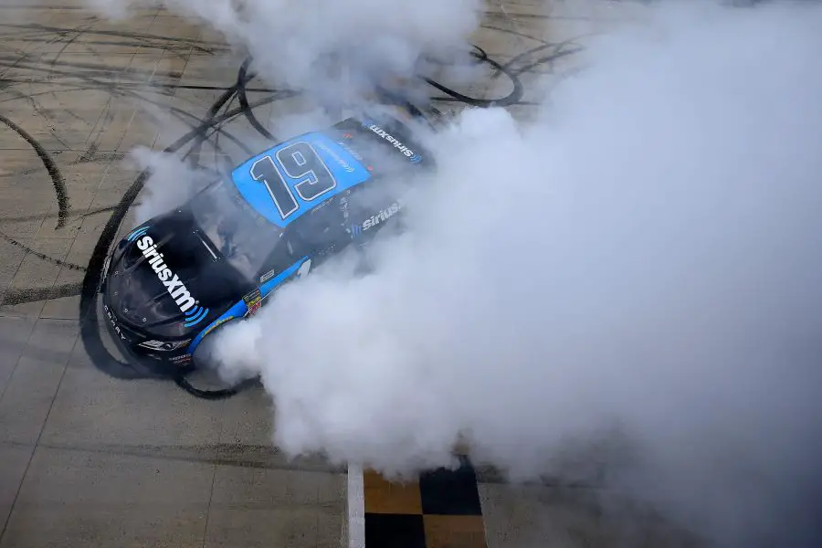 Martin Truex celebrates victory at the Monster Mile