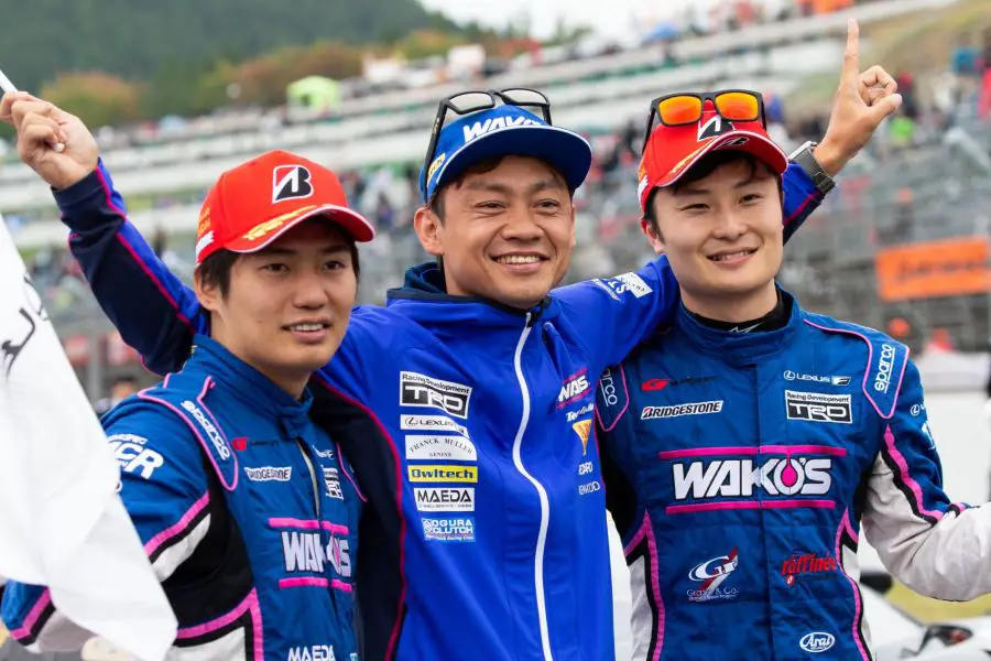 Super GT champions 2019 Kazuya Oshima and Kenta Yamashita with Yuichi Wakisaka