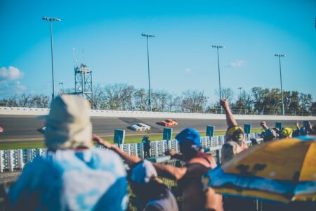 People Cheering at a Nascar Race