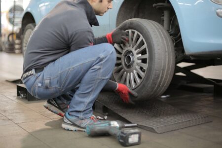 Mechanic Replacing A Tyre