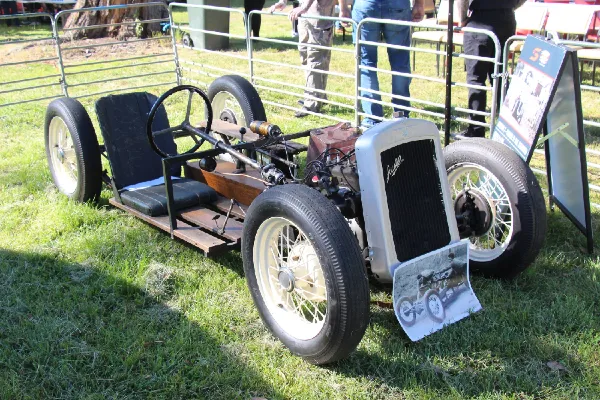 Austin 7 hot rod on display in a field